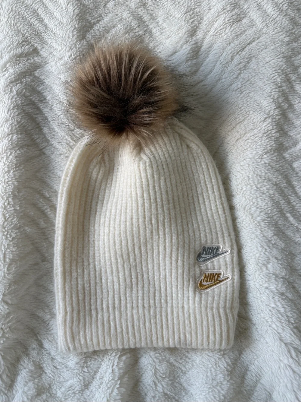 Nike Cream Ribbed Knit Beanie with Brown Faux Fur Pom